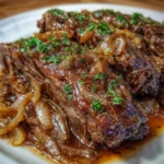 Roast beef in Instant Pot with golden onions and herbs